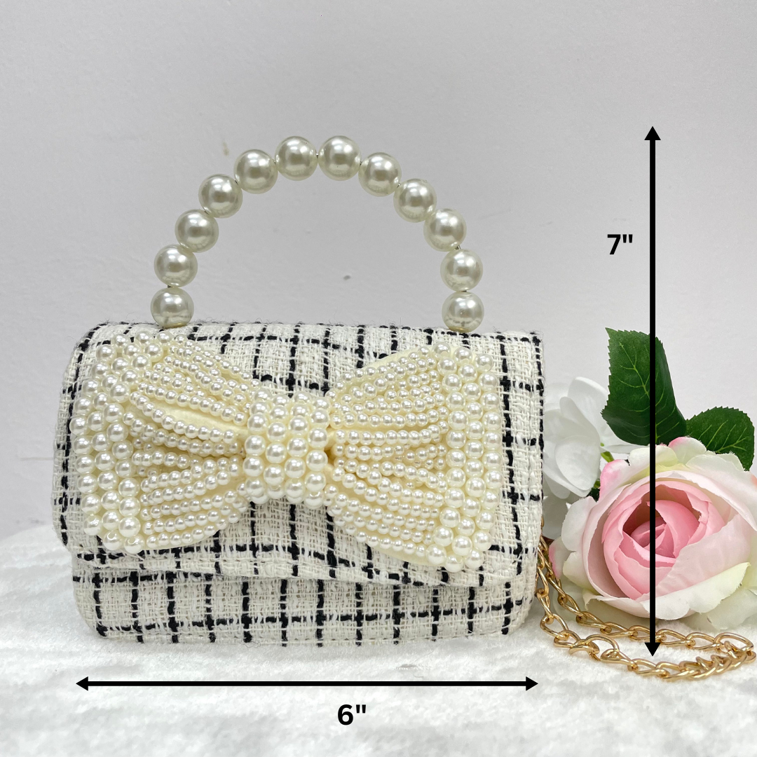 
                  
                    Black And White Tweed Bag With A Crystal Bow
                  
                