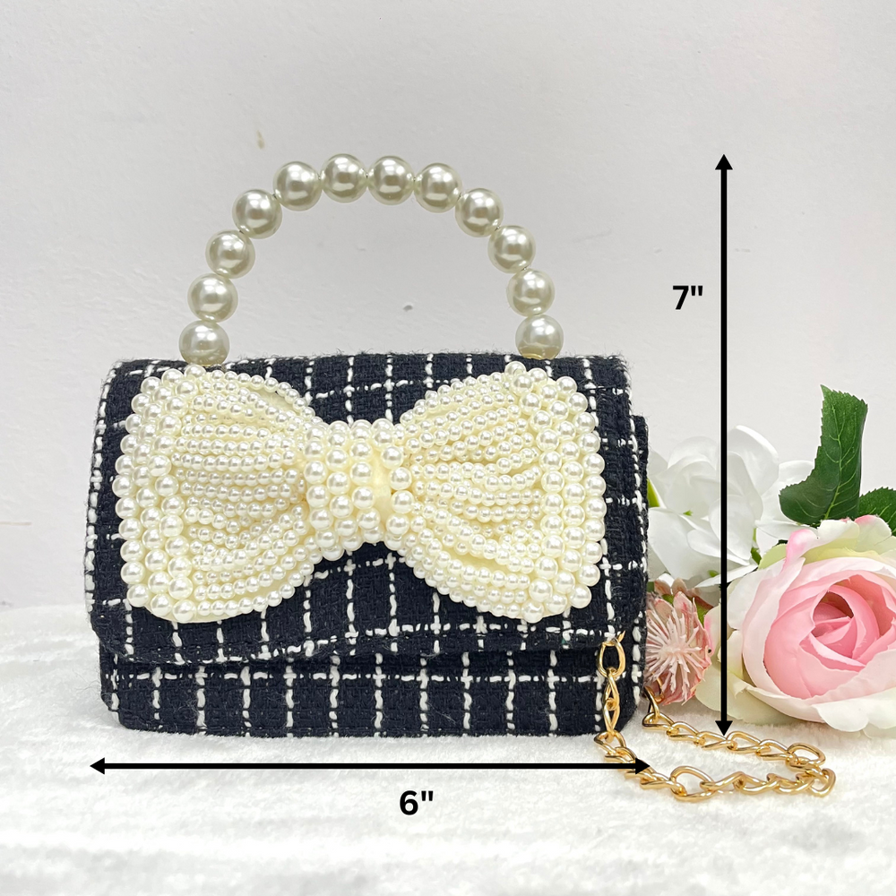 
                  
                    Black And White Tweed Bag With A Crystal Bow
                  
                