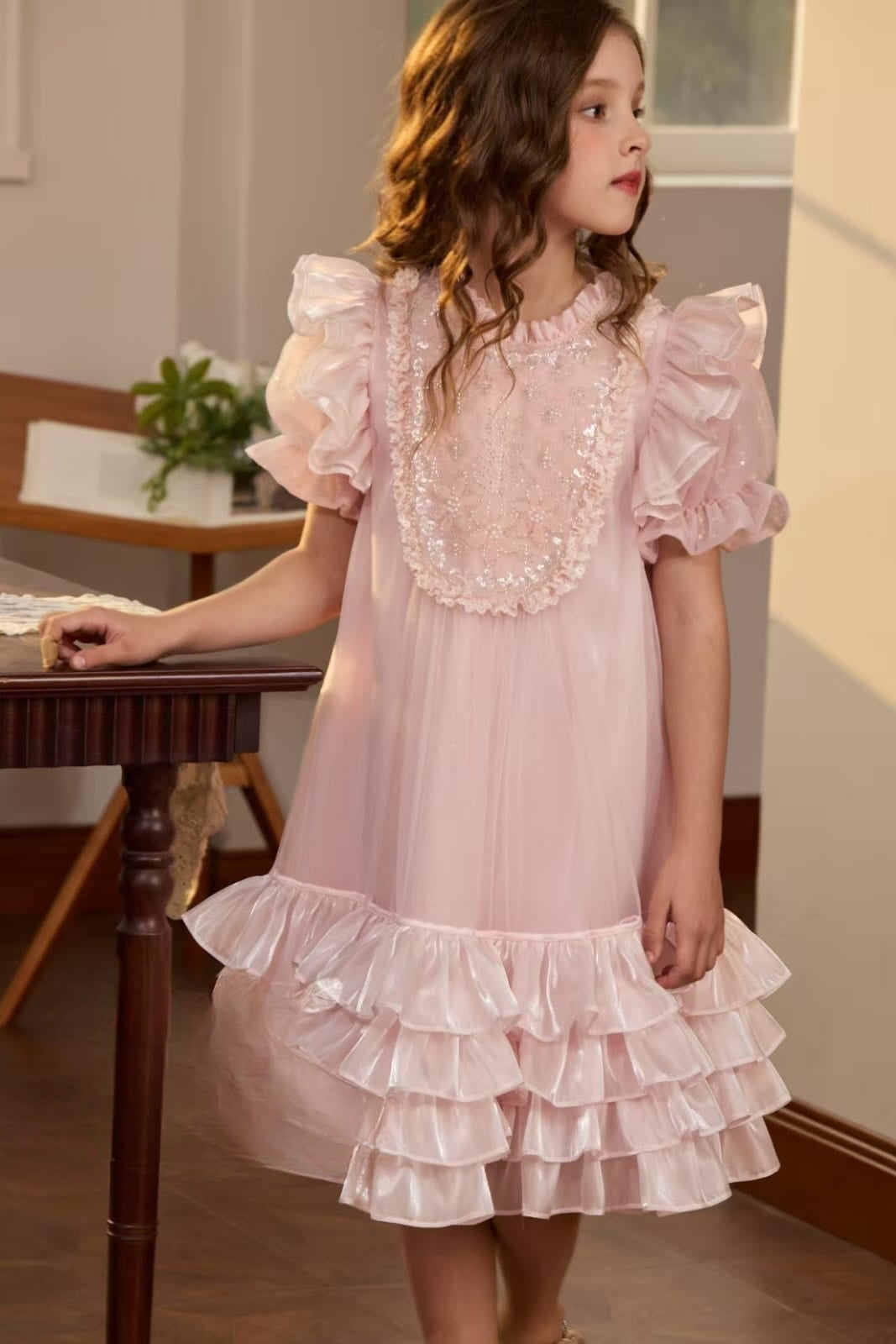 PINK RUFFLE SLEEVE WITH BEAUTIFUL SEQ WORK ON CHEST