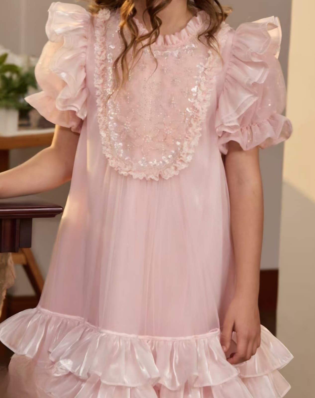 PINK RUFFLE SLEEVE WITH BEAUTIFUL SEQ WORK ON CHEST